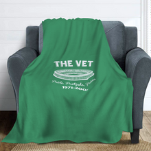 Load image into Gallery viewer, The Vet Pride, Pretzels, Prison Vintage Veterans Stadium Kelly Green Blanket | 62&quot;W x 78&quot;L on a couch

