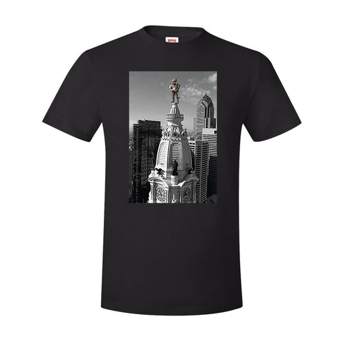 Jason Kelce City Hall T-Shirt | Kelce City Hall Statue Black T-Shirt the front of this t-shirt has jason kelce on top of city hall