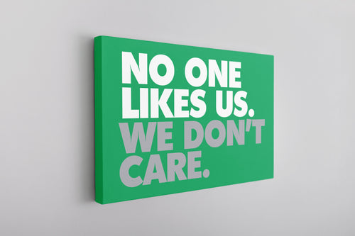 No One Likes Us Canvas | No One Likes Us We Don't Care Kelly Green Wall Canvas the front of this canvas says no one likes us we dont care